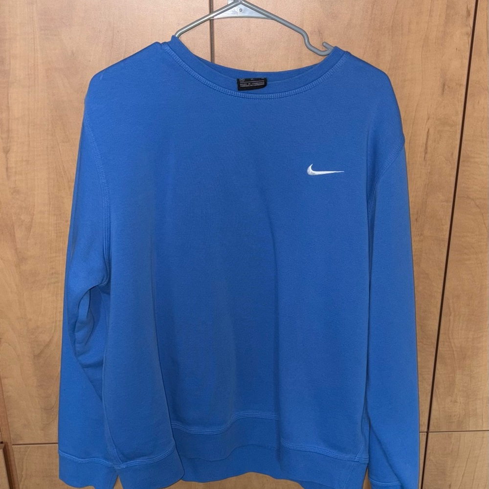 Bright blue Nike Crewneck. Good condition